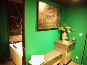 Appartements Sejour detente a Saint-Omer - jacuzzi prive, terrasse, centre-ville et parking gratuit : photos des chambres