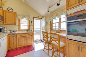 Deck with Water View Coastal Escape Near P-Town!