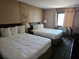 Queen Room with Two Queen Beds room in Crookston Inn & Convention Center