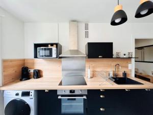 Appartements Le Boboheme - Wifi - Parking : photos des chambres