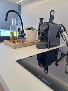 Cosy tiny houseboats near beach and restaurants by Weltevreden Experience