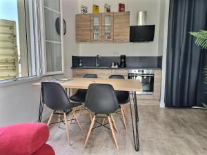 Appartements Le Pit-Stop - Wifi - Parking : photos des chambres