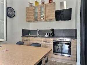 Appartements Le Pit-Stop - Wifi - Parking : photos des chambres