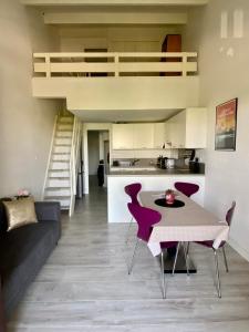 Appartements Appartement Duplex Climatise Le Trident : photos des chambres