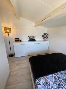 Appartements Appartement Duplex Climatise Le Trident : photos des chambres