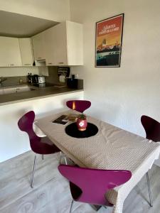 Appartements Appartement Duplex Climatise Le Trident : photos des chambres