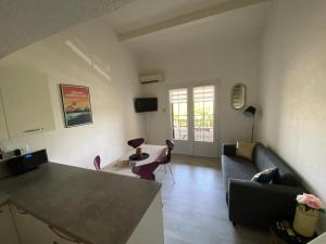 Appartements Appartement Duplex Climatise Le Trident : photos des chambres