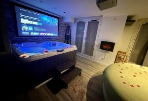 Appartements Appartement Love Room/Jacuzzi : photos des chambres