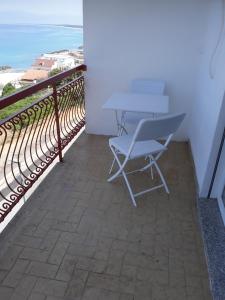 Doppelzimmer mit Balkon und Meerblick