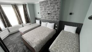 Quadruple Room room in Charlotte Guest House