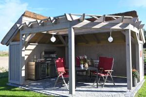 Reethaus "Ankerplatz mit Wintergarten" für 4 Personen Käptn Jan Glowe