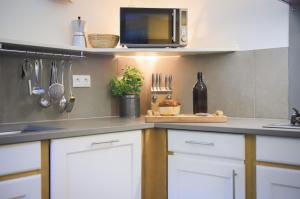 Appartements Venez Chez Vous - Aux Premieres Loges Appartement Pieds dans l'eau : photos des chambres