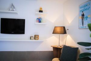 Appartements Venez Chez Vous - Aux Premieres Loges Appartement Pieds dans l'eau : photos des chambres