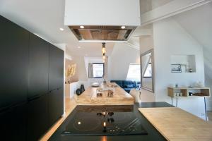 Appartements O' Loft*centre ville* : photos des chambres