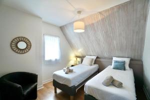 Appartements Logis Magnolia : photos des chambres