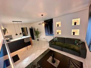 Appartements Le Tropical sublime ambiance Jungle proche Metz : photos des chambres