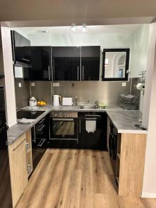 Appartements Appartement cosy avec jardin proche de la gare : photos des chambres