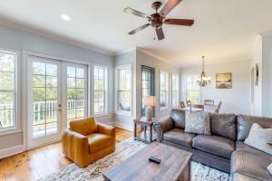 Palm-Lined 3BR Home with Dock Access and Fire Pit