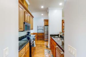 Palm-Lined 3BR Home with Dock Access and Fire Pit