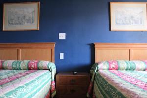 Queen Room with Two Queen Beds room in Flagstaff Motel