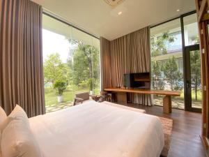 Phòng Deluxe Giường Đôi/2 Giường Đơn Nhìn Ra Vườn (Deluxe Double or Twin Room with Garden View)