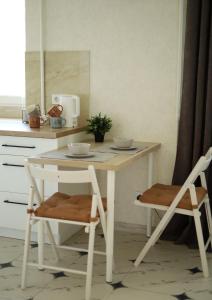 White Deluxe Apartments