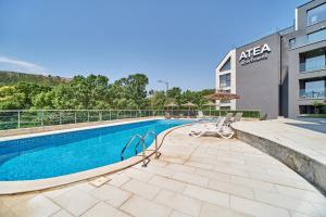 ATEA complex with pool next to the beach
