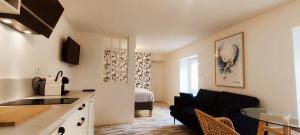 Appartements La Douce Angevine - La Chouette - Proche Centre : photos des chambres