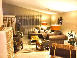 Villas La Maison du Bonheur F5 jardin et piscine : photos des chambres