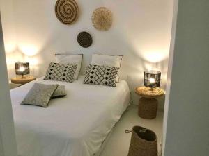 Villas La Maison du Bonheur F5 jardin et piscine : photos des chambres