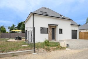 Maisons de vacances Instants detente en famille au Tour-du Parc : Maison de Vacances