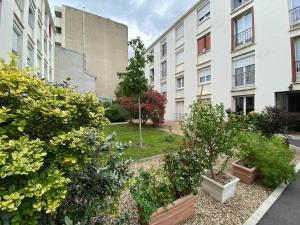 Appartements THE VINTAGE, appartement a 200m de la gare de Bois Colombes : photos des chambres