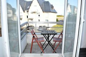 Appartements Le petit Courseulles - entre le port et la mer : photos des chambres