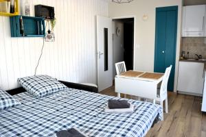 Appartements Le petit Courseulles - entre le port et la mer : photos des chambres