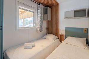 Maisons de vacances Mobil-home de 40 m2 tout equipe : photos des chambres