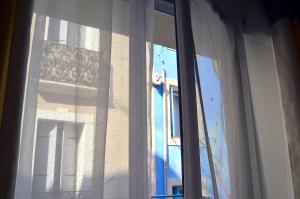 Charmante maisonnette au coeur de ville avec balcon - 70 m2