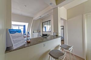 Appartements Studio Christiane - en plein coeur de Roscoff : photos des chambres