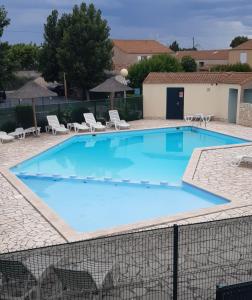 Appartement T2, terrasse, piscine, clim, proche plage