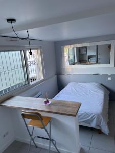 Appartements studio rdc : photos des chambres