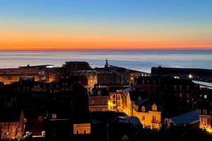 Appartements Vue panoramique sur la mer et les falaises : photos des chambres