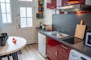 Appartements Les Petrels by Nid'Ouest - Coeur de ville : photos des chambres