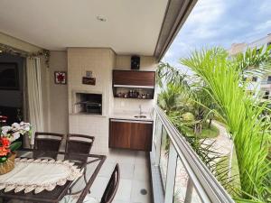 Home 43| Apto em cond Pé na Areia em Bertioga