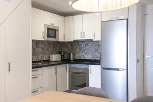 Apartment Playa Las Vistas 2 with breathtaking sea view, only 100 m to the sea, heated pool, aircondition for a fee, wifi