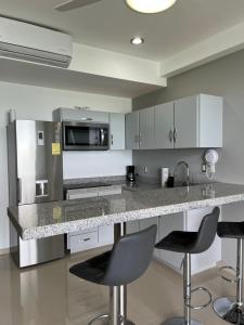 Departamento en Tramonto Resort con vista al mar