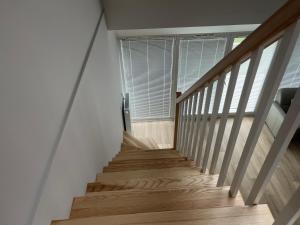 Dwupoziomowy apartament nr 24 z dużym balkonem i podziemnym parkingiem we Władysławowie