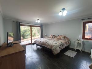 Casa con quincho y piscina privados