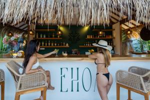 EHOA NYANYI BEACH Boutique Hotel - In front of entrance to NUANU