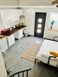 Maisons de vacances Tiny house 4 min drive to Cdg airport : photos des chambres