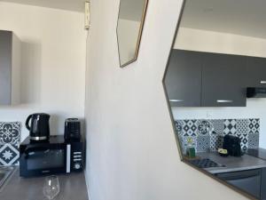 Appartements Studio cosy rue Alexander Taylor, Wifi, 2 pers : photos des chambres
