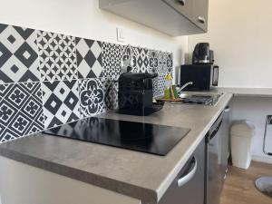 Appartements Studio cosy rue Taylor, wifi, 2 pers : photos des chambres